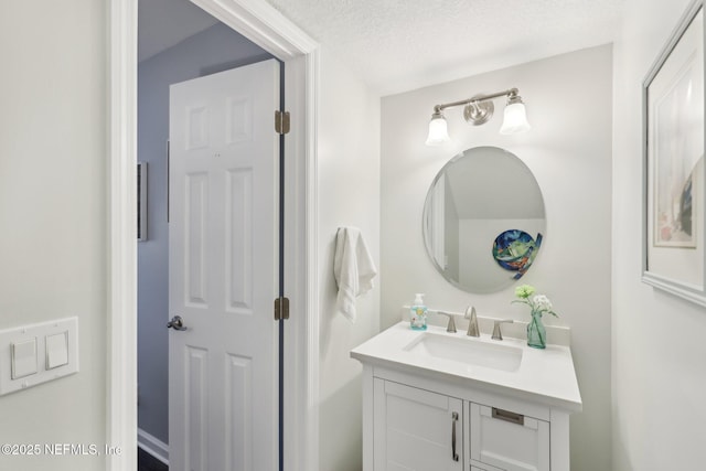 303 Vista Lagoon Ct Unit C-3, Ponte Vedra Beach, FL 32082 - bathroom with vanity and a textured ceiling