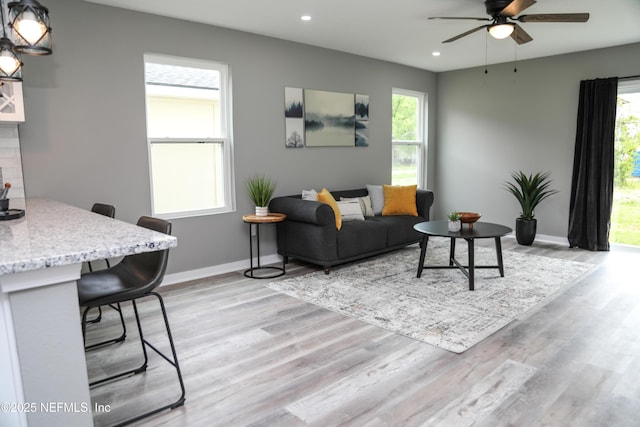 1207 Neva St, Jacksonville, FL 32205 - living room featuring recessed lighting, ceiling fan, light wood finished floors, plenty of natural light, and baseboards
