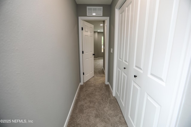 1207 Neva St, Jacksonville, FL 32205 - corridor with carpet floors and baseboards