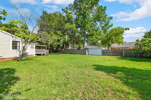 1724 Orlando Cir N, Jacksonville, FL 32207 - view of yard with a deck and cooling unit