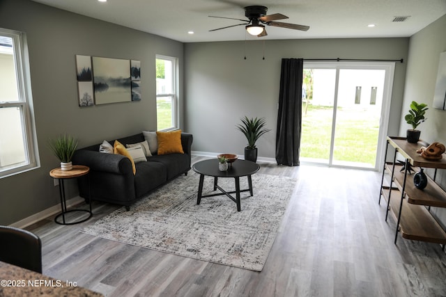1205 Neva St, Jacksonville, FL 32205 - living area featuring wood finished floors, recessed lighting, baseboards, and ceiling fan