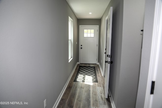 1205 Neva St, Jacksonville, FL 32205 - doorway with baseboards and wood finished floors