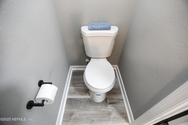 1205 Neva St, Jacksonville, FL 32205 - bathroom featuring toilet and wood finished floors