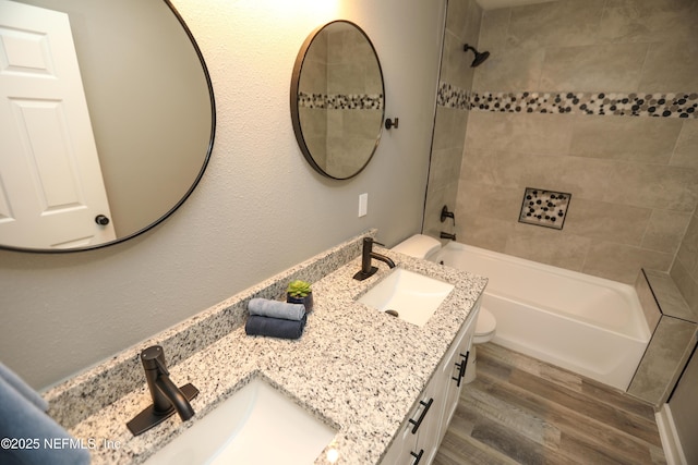 1205 Neva St, Jacksonville, FL 32205 - full bathroom featuring double vanity, wood finished floors, toilet, and bathing tub / shower combination