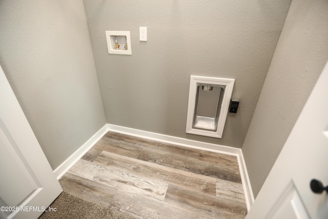 1205 Neva St, Jacksonville, FL 32205 - washroom with washer hookup, wood finished floors, and baseboards
