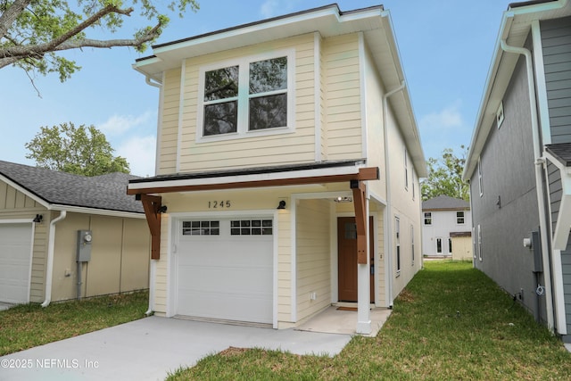 1205 Neva St, Jacksonville, FL 32205 - view of front of home featuring concrete driveway, an attached garage, and a front lawn