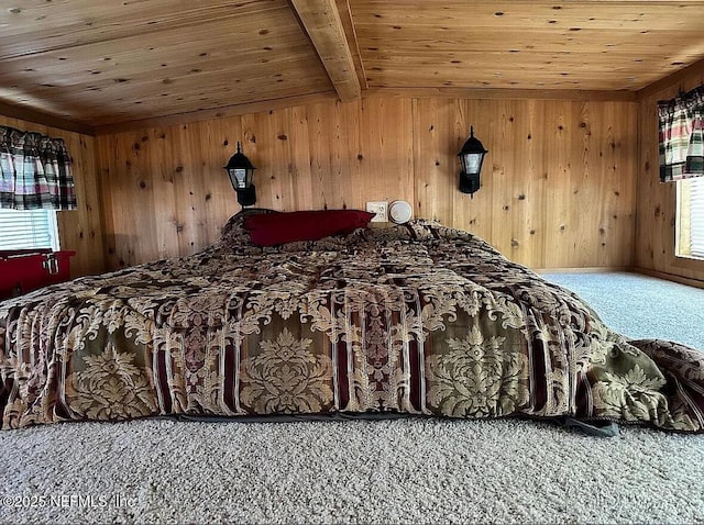 bedroom featuring carpet, wooden ceiling, wood walls, and beam ceiling