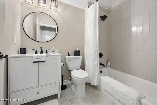 1611 Nottingham Knoll Dr, Jacksonville, FL 32225 - full bath featuring toilet, vanity, shower / tub combo, a textured ceiling, and wood finished floors