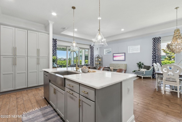 61 Sunrise Vista Way, Ponte Vedra, FL 32081 - kitchen featuring gray cabinetry, wood-type flooring, a sink, dishwasher, and crown molding