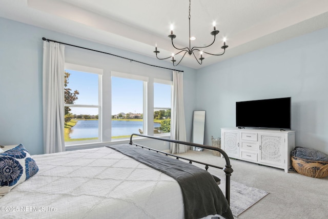 61 Sunrise Vista Way, Ponte Vedra, FL 32081 - carpeted bedroom with a chandelier and multiple windows