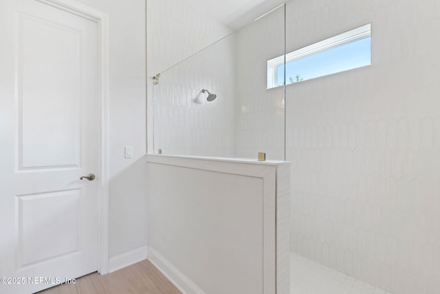 61 Sunrise Vista Way, Ponte Vedra, FL 32081 - bathroom with walk in shower, baseboards, and wood finished floors