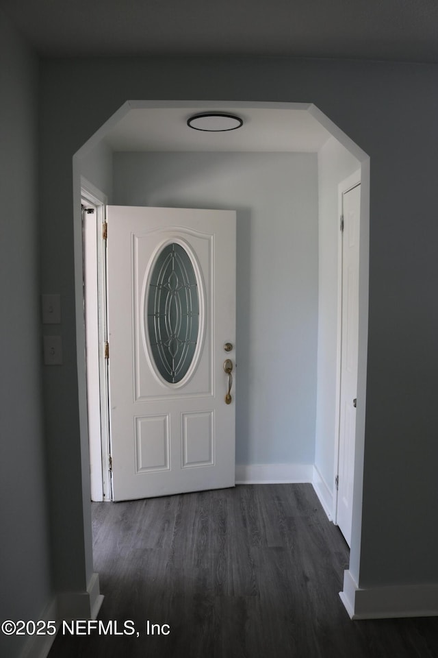2242 Lake Lucina Dr, Jacksonville, FL 32211 - entrance foyer with dark wood-style floors and baseboards