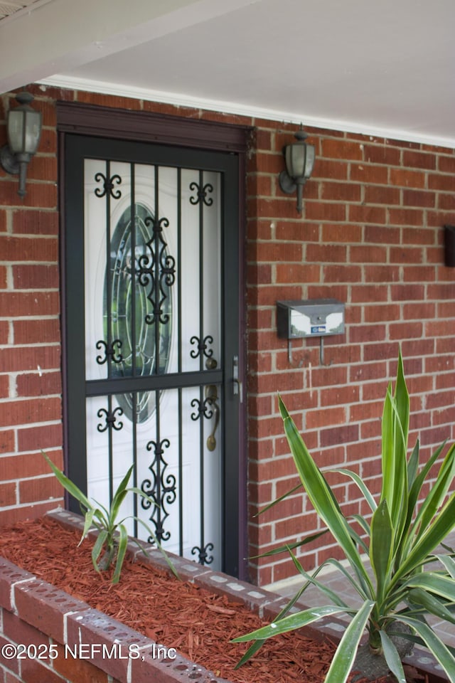 2242 Lake Lucina Dr, Jacksonville, FL 32211 - property entrance with brick siding