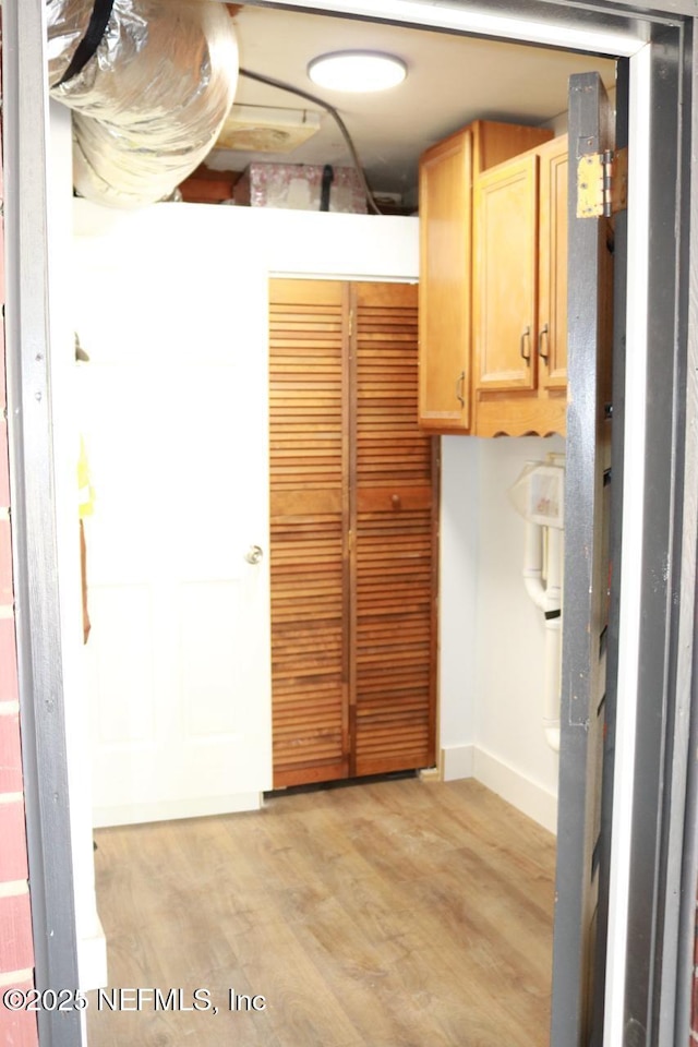 2242 Lake Lucina Dr, Jacksonville, FL 32211 - interior space featuring light wood-style flooring and baseboards