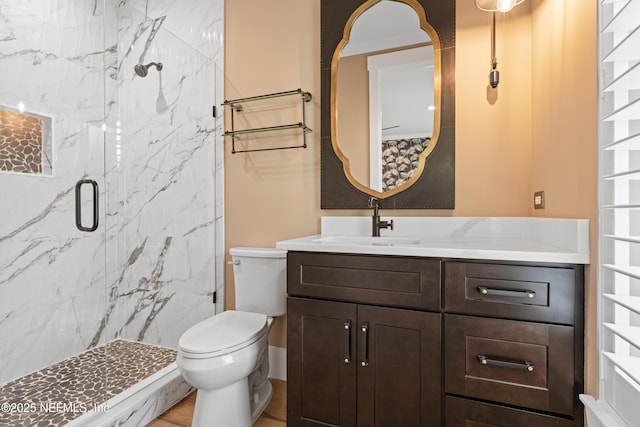 520 E Coast Dr, Atlantic Beach, FL 32233 - bathroom with a marble finish shower, vanity, and toilet