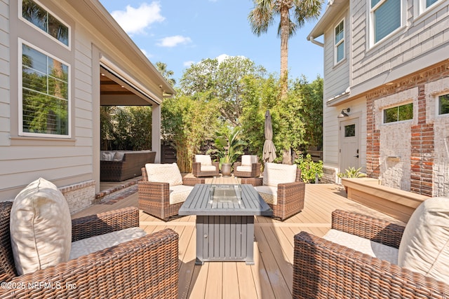 520 E Coast Dr, Atlantic Beach, FL 32233 - wooden deck featuring an outdoor living space
