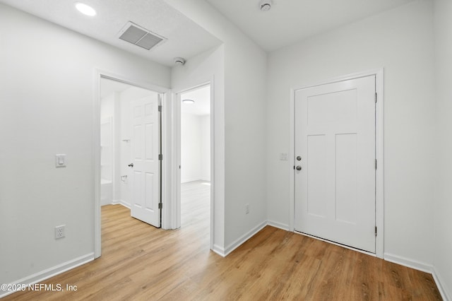 323 Rustic Rd, Satsuma, FL 32189 - foyer featuring light wood finished floors and baseboards
