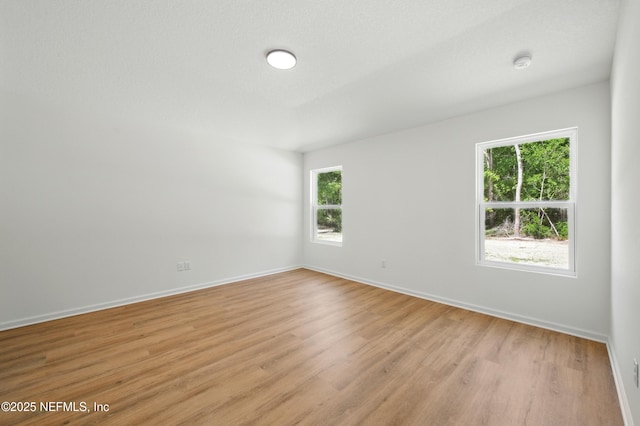 323 Rustic Rd, Satsuma, FL 32189 - spare room with light wood-type flooring and baseboards