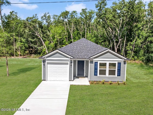 323 Rustic Rd, Satsuma, FL 32189 - ranch-style house featuring roof with shingles, concrete driveway, a garage, and a front lawn