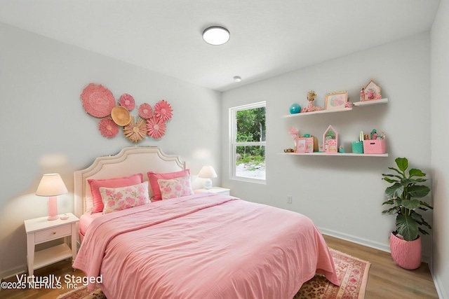 323 Rustic Rd, Satsuma, FL 32189 - bedroom with wood finished floors and baseboards