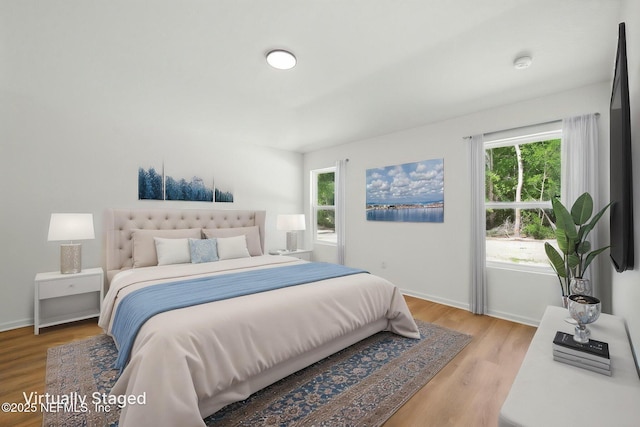 323 Rustic Rd, Satsuma, FL 32189 - bedroom with light wood-style floors and baseboards