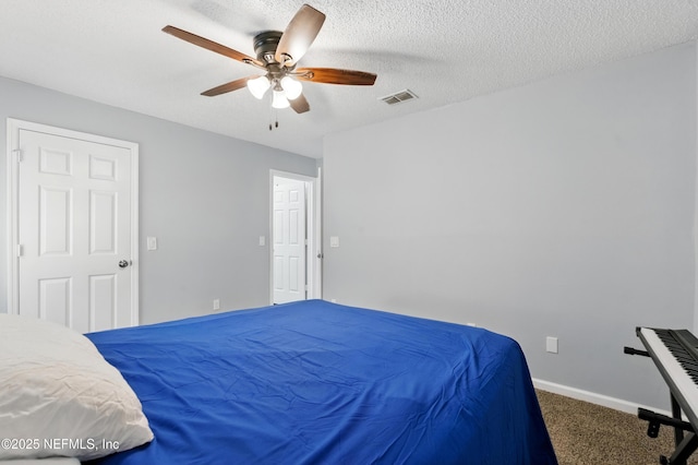 1961 Spring Drive Rd, Jacksonville, FL 32209 - carpeted bedroom with a ceiling fan and baseboards