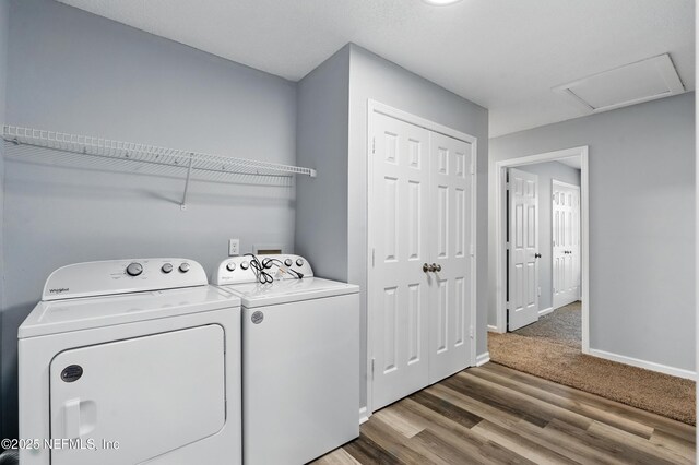 1961 Spring Drive Rd, Jacksonville, FL 32209 - washroom featuring separate washer and dryer, baseboards, wood finished floors, and attic access
