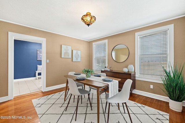 3712 Trask St, Jacksonville, FL 32205 - dining space with ornamental molding, baseboards, and wood finished floors