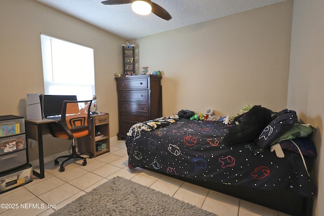502 Vermont Ave, Green Cove Springs, FL 32043 - bedroom featuring a textured ceiling, tile patterned flooring, a desk, and ceiling fan