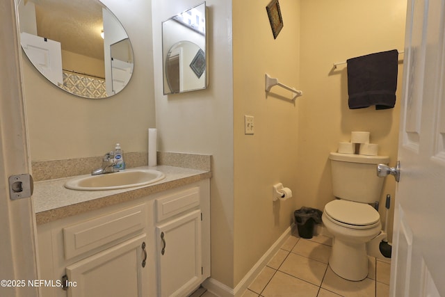 502 Vermont Ave, Green Cove Springs, FL 32043 - full bath with tile patterned flooring, toilet, baseboards, and vanity