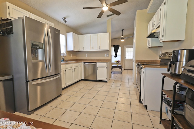 502 Vermont Ave, Green Cove Springs, FL 32043 - kitchen featuring appliances with stainless steel finishes, ceiling fan, a sink, light tile patterned flooring, and healthy amount of natural light