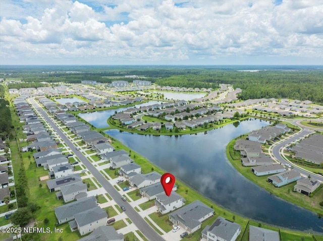1828 Amberly Dr, Middleburg, FL 32068 - aerial view of residential area with a nearby body of water and a forest