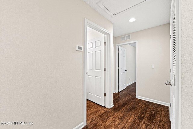 3143 Post St, Jacksonville, FL 32205 - corridor featuring baseboards, wood finished floors, and recessed lighting