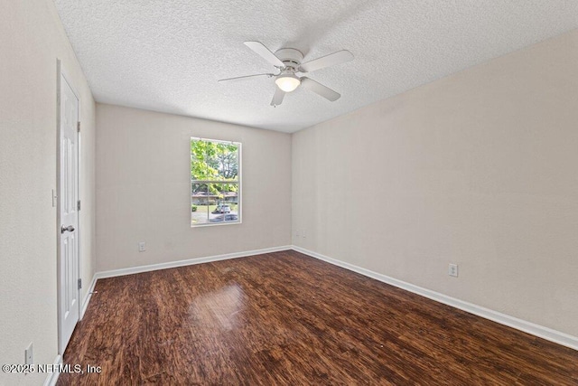 3143 Post St, Jacksonville, FL 32205 - unfurnished room with wood finished floors, a ceiling fan, a textured ceiling, and baseboards