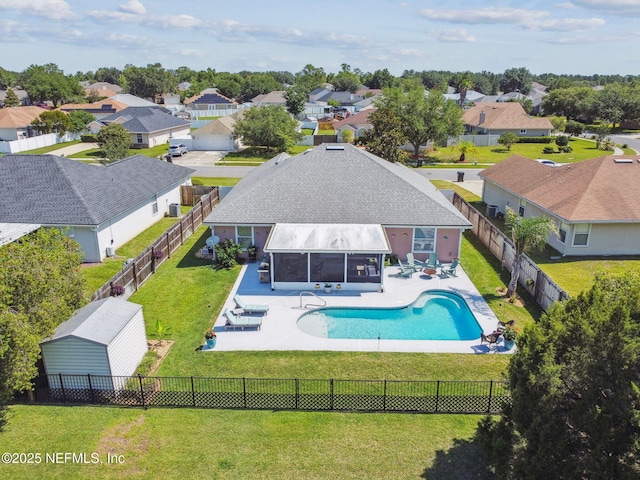 3684 Arava Dr, Green Cove Springs, FL 32043 - view of pool with a patio, a residential view, and a sunroom