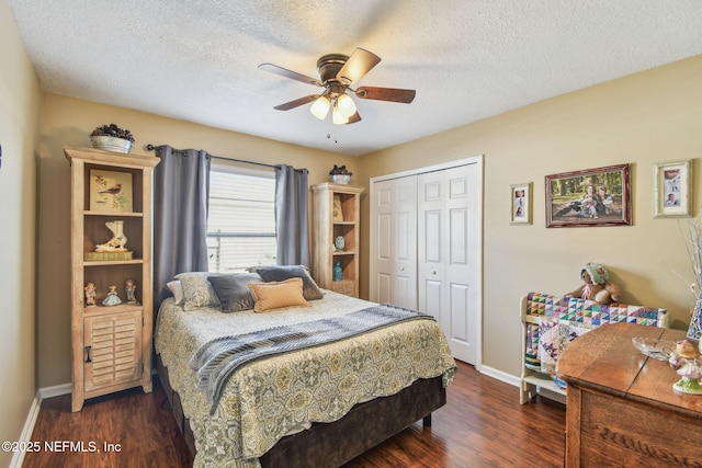 3684 Arava Dr, Green Cove Springs, FL 32043 - bedroom with a closet, wood finished floors, a textured ceiling, and baseboards