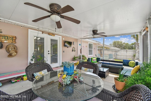 3684 Arava Dr, Green Cove Springs, FL 32043 - sunroom / solarium featuring french doors, outdoor dining area, a ceiling fan, and outdoor lounge area
