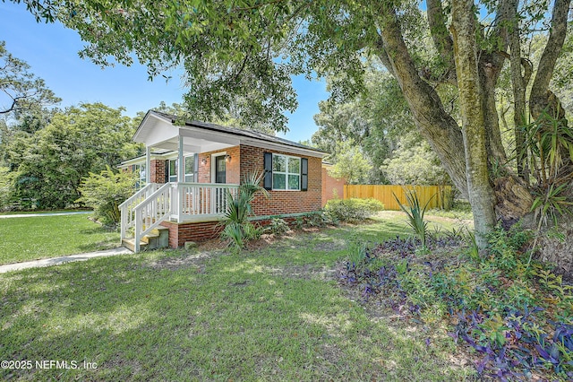 8198 Paul Jones Dr, Jacksonville, FL 32208 - view of front of home with brick siding