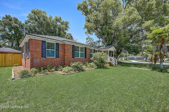 8198 Paul Jones Dr, Jacksonville, FL 32208 - ranch-style home featuring brick siding