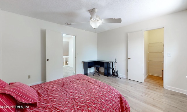 5325 Julington Ridge Dr S, Jacksonville, FL 32258 - bedroom with light wood-style floors, baseboards, and ceiling fan