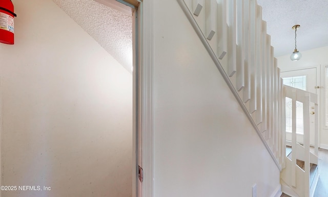 5325 Julington Ridge Dr S, Jacksonville, FL 32258 - stairs featuring a textured ceiling