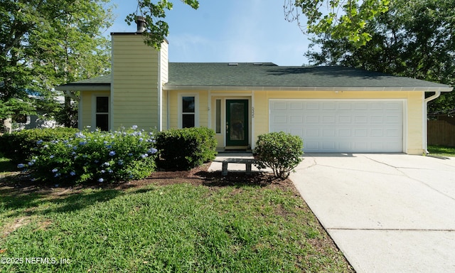 5325 Julington Ridge Dr S, Jacksonville, FL 32258 - view of front of house with concrete driveway, a garage, a chimney, and roof with shingles