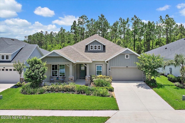 529 Crosswater Lake Dr, Ponte Vedra, FL 32081 - craftsman-style house with an attached garage, concrete driveway, stone siding, and roof with shingles