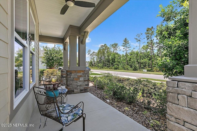 529 Crosswater Lake Dr, Ponte Vedra, FL 32081 - covered porch with a ceiling fan