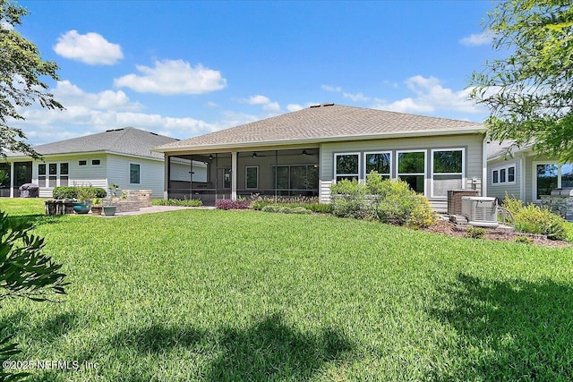 529 Crosswater Lake Dr, Ponte Vedra, FL 32081 - back of property featuring a sunroom, a yard, ceiling fan, and roof with shingles
