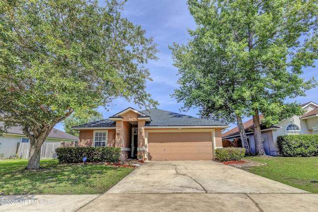 1695 Northglen Cir, Middleburg, FL 32068 - ranch-style home with concrete driveway, a garage, and stucco siding