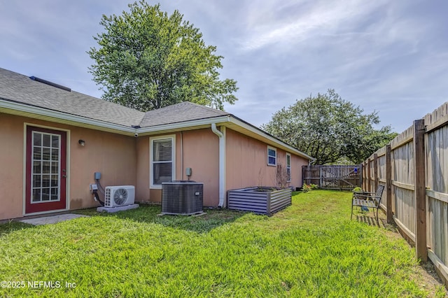 1695 Northglen Cir, Middleburg, FL 32068 - view of yard featuring central AC and ac unit