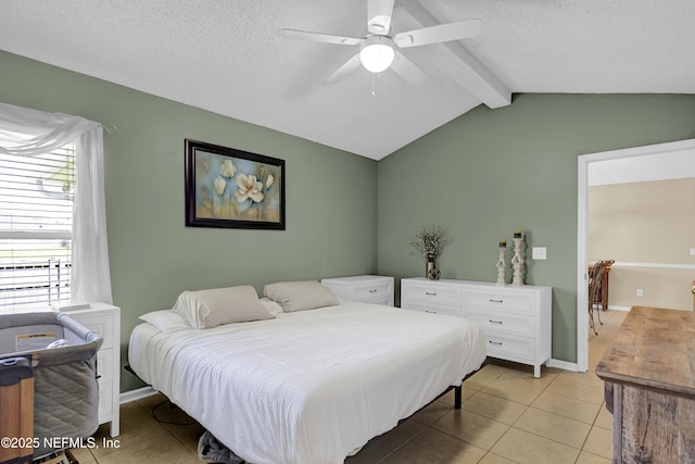 1695 Northglen Cir, Middleburg, FL 32068 - bedroom featuring light tile patterned floors, a textured ceiling, a ceiling fan, and baseboards