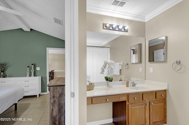 1695 Northglen Cir, Middleburg, FL 32068 - bathroom featuring a textured ceiling, tile patterned flooring, vanity, and ornamental molding