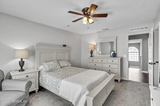 1483 Seawolf Trl N, Jacksonville, FL 32221 - bedroom with light colored carpet, a textured ceiling, ceiling fan, and baseboards